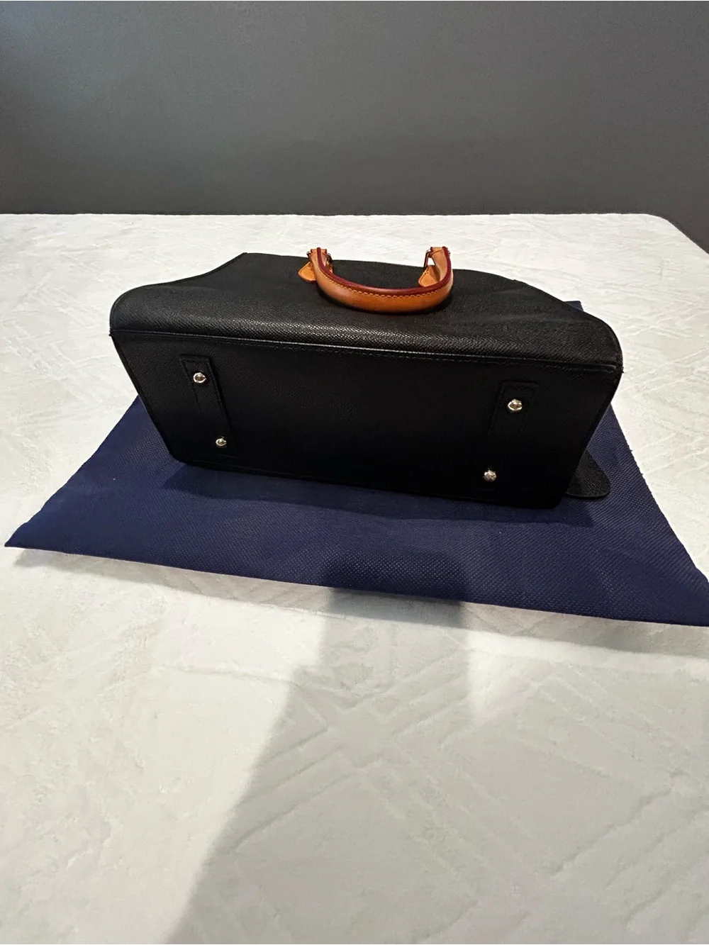 Dooney and Bourke Black Leather Satchel with Tan Leather Handles and Key Fob